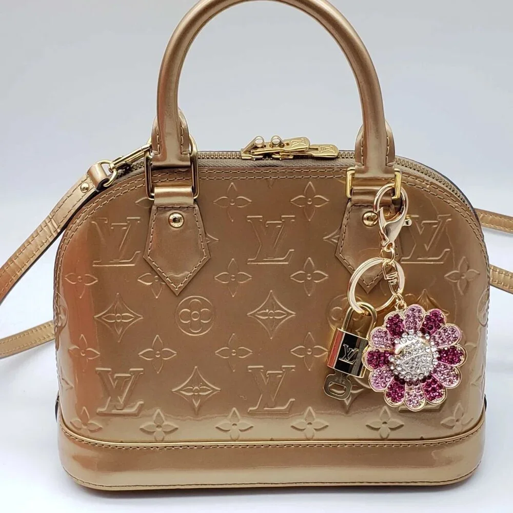 Authentic Louis Vuitton Lock & Key with unbranded Flower Bagcharm, Keycharm